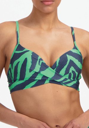 Kobieta ubrana w zielony i ciemnoniebieski bikini top z cienkimi ramiączkami i wiązanym z przodu, widoczna od szyi do pasa.