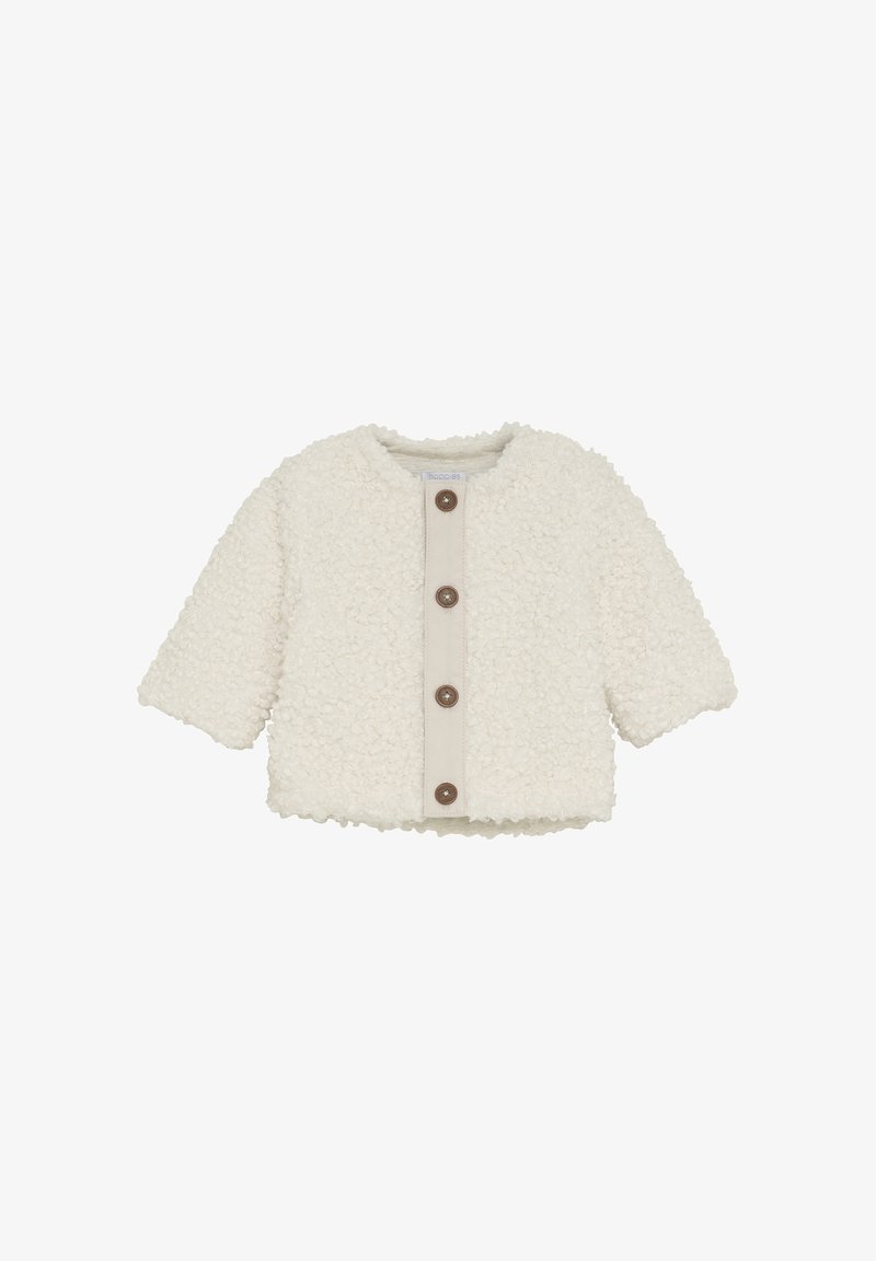 Giacca per toddler color crema, con texture, maniche lunghe e quattro bottoni marroni sul davanti.