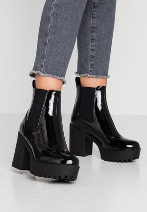 Bottines à talons hauts - black