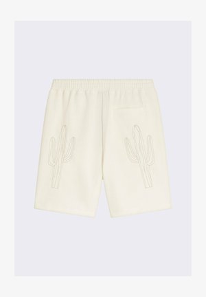 Pantalones cortos de algodón blanco con bordado de cactus en ambos lados. Cuenta con una cintura elástica y un bolsillo trasero. Tejido con textura tipo gofre.
