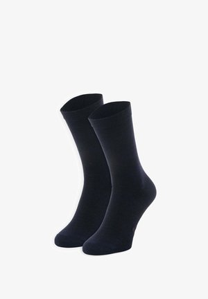 Marineblaue Socken aus einem glatten Baumwollmix, mit geripptem oberen Saum, in mittlerer Wadenlänge und verstärkter Ferse und Zehen.
