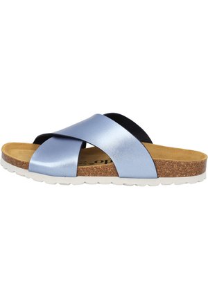 Light blue and black leather slide sandal with a cork midsole and white EVA outsole, featuring crossed straps and a flat footbed.