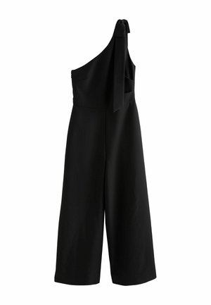 Salopetă neagră cu un singur umăr, pantaloni largi și un detaliu cu nod pe breteaua unică de pe umăr.