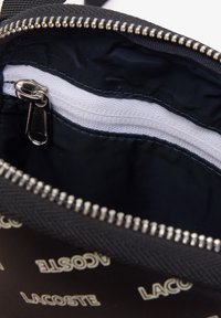 Lacoste SEASONAL UNISEX - Borsa a tracolla - noir farine