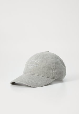 Gray cap made of fabric with a curved brim, featuring embroidered text in white. The design includes ventilation holes and a adjustable strap.
