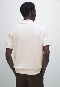 Massimo Dutti Poloshirt - light yellow