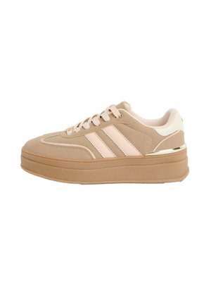 Beige platform sneaker with light pink stripes, beige laces, and a thick rubber sole with white padded heel collar and metallic accent.