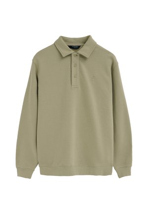 Polo beige de manga larga con tres botones, puños acanalados y un pequeño logo bordado en el pecho izquierdo.