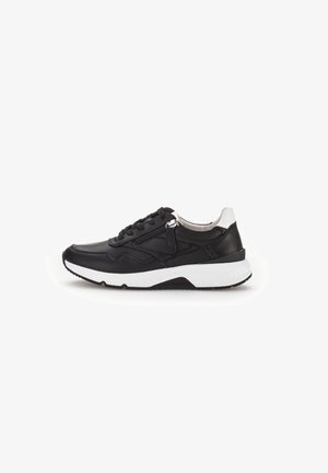 Black leather sneaker with a white sole, featuring a lace closure, zip detail on the side, and a contrasting silver heel accent.