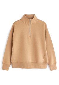 Beige lange mouwen pullover met een opstaande kraag en een zilveren rits aan de voorkant die tot halverwege de borst loopt.