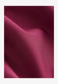Unselected, piped burgundy red
