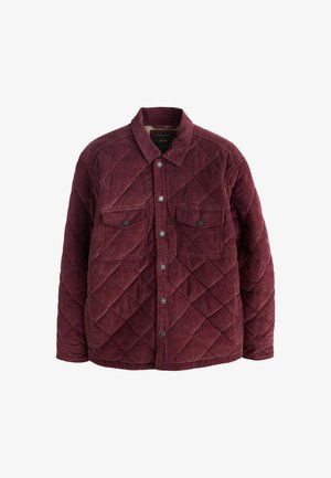 Burgundy quilted jacket made of corduroy, featuring a collar, snap buttons, and two chest pockets with flaps. Diamond patterns throughout.
