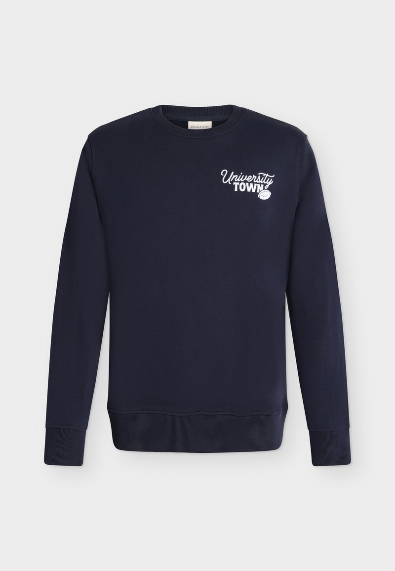 Mørkeblå sweatshirt med lange ærmer med hvid "University Town"-tekst og lille baseballgrafik på øverste venstre bryst.