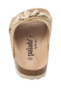 Sandalo scivoloso con tomaia intrecciata naturale, un elegante fiocco color crema, sole in sughero e plantare testurizzato. Colore beige chiaro, interno liscio.