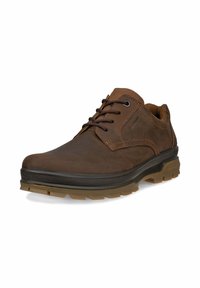 Chaussure en cuir marron avec une finition lisse, bout rond et design à lacets. Présente un col texturé marron et une semelle extérieure en caoutchouc robuste.