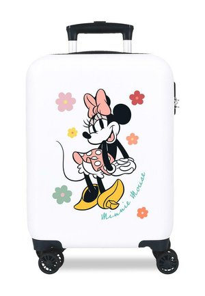 Maleta rígida blanca con cuatro ruedas giratorias negras que presenta a Minnie Mouse con un vestido rosa de lunares y un lazo, rodeada de flores coloridas.