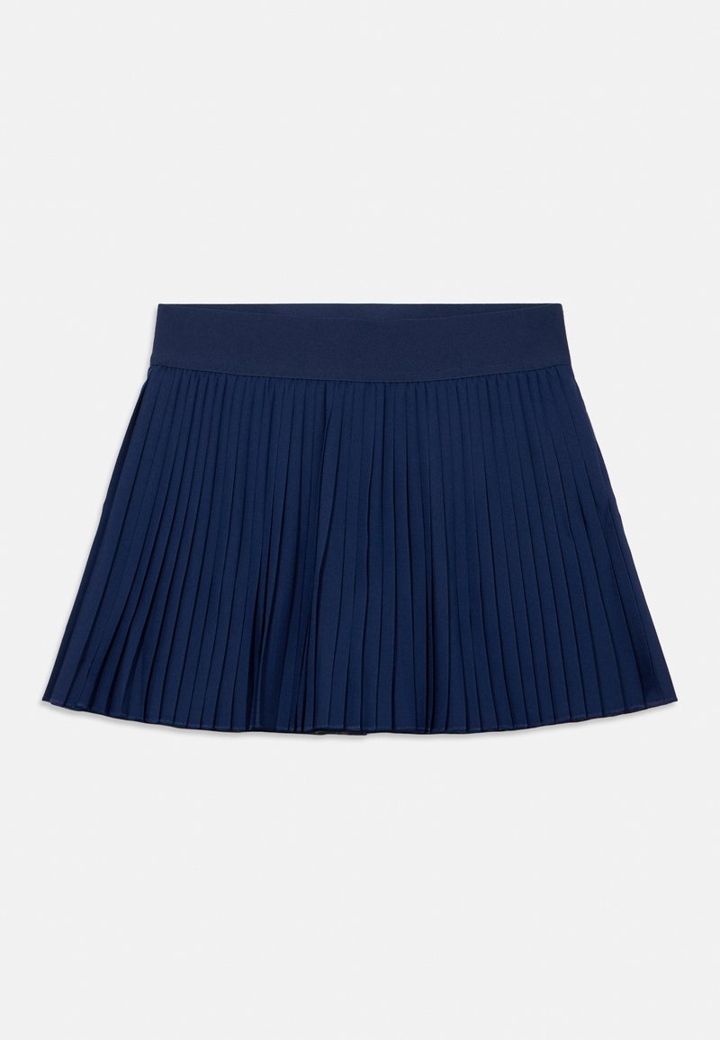 Φούστα σε ναυτικό μπλε με πιέτες και φαρδιά μέση, τοποθετημένη επίπεδα σε λευκό φόντο.
