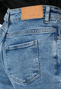 Noisy May NMYOLANDA - Wide leg - medium blue denim