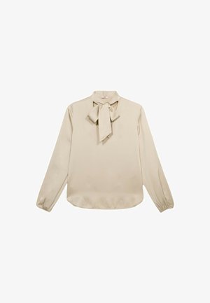 Blusa de manga larga color beige con un detalle de lazo en el escote, textura suave y puños fruncidos, con un dobladillo redondeado.