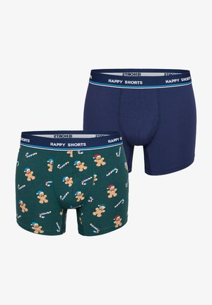 Het boxershortset omvat een navy paar en een groen paar met een patroon van een peperkoekmannetje en een zuurstok. Elastische tailleband met het label "HAPPY SHORTS."
