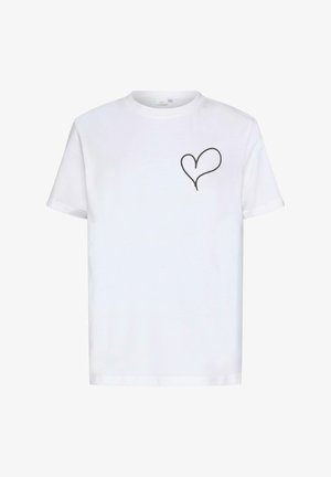 T-shirt blanc à manches courtes avec un simple design de cœur en silhouette noire sur la poitrine gauche, présenté sur un fond uni.
