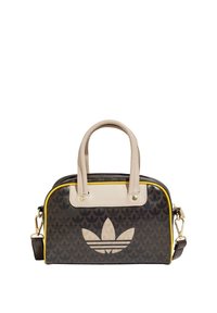 Svart mönstrad handväska med krämfärgade accenter, övre handtag och avtagbar rem. Har en framträdande beige Adidas-logotyp på framsidan.