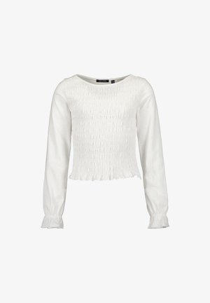 Blouse blanche à manches longues avec devant et dos froncés, encolure ronde et poignets et ourlet à volants.