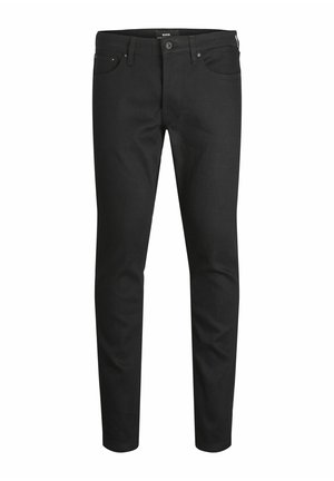 Schwarze Jeans aus Denim mit schlanker Passform, ausgestattet mit fünf Taschen, Metallbeschlägen und einer glatten Textur. Minimalistisches Design ohne Muster.
