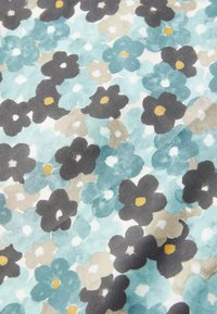 Floral fabric featuring small teal, black, and beige flowers with yellow centers on a light background. Soft, textured material.