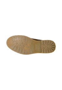 Semelle d'une botte marron avec des crampons profonds et des motifs en forme de croix, grip en caoutchouc, et une section rectangulaire texturée au centre.