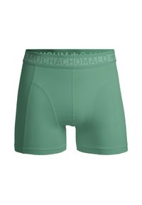 Menta zöld boxeralsó, puha textúrával, széles derékkal, amelyre a "MUCHACHO" felirat van gravírozva. Kényelmes és testhezálló fazon.