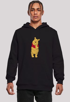 Black hoodie featuring a large, textured illustration of a cartoon bear in a red shirt. The design is centered on the front.