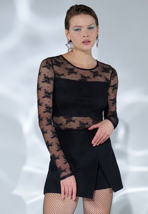 Pusero - black