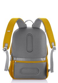 Gray backpack with yellow accents, featuring a textured surface, padded straps, zippered pockets, and a structured, contoured shape.