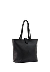 Sac cabas en cuir noir avec deux bretelles et une fermeture centrale à languette, présenté sur fond blanc.