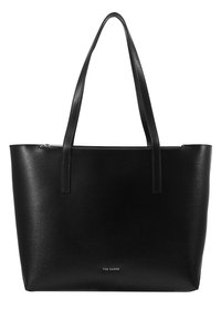 Sac cabas en cuir noir avec longues anses et fermeture éclair sur le dessus, arborant un petit logo Ted Baker au centre inférieur avant.