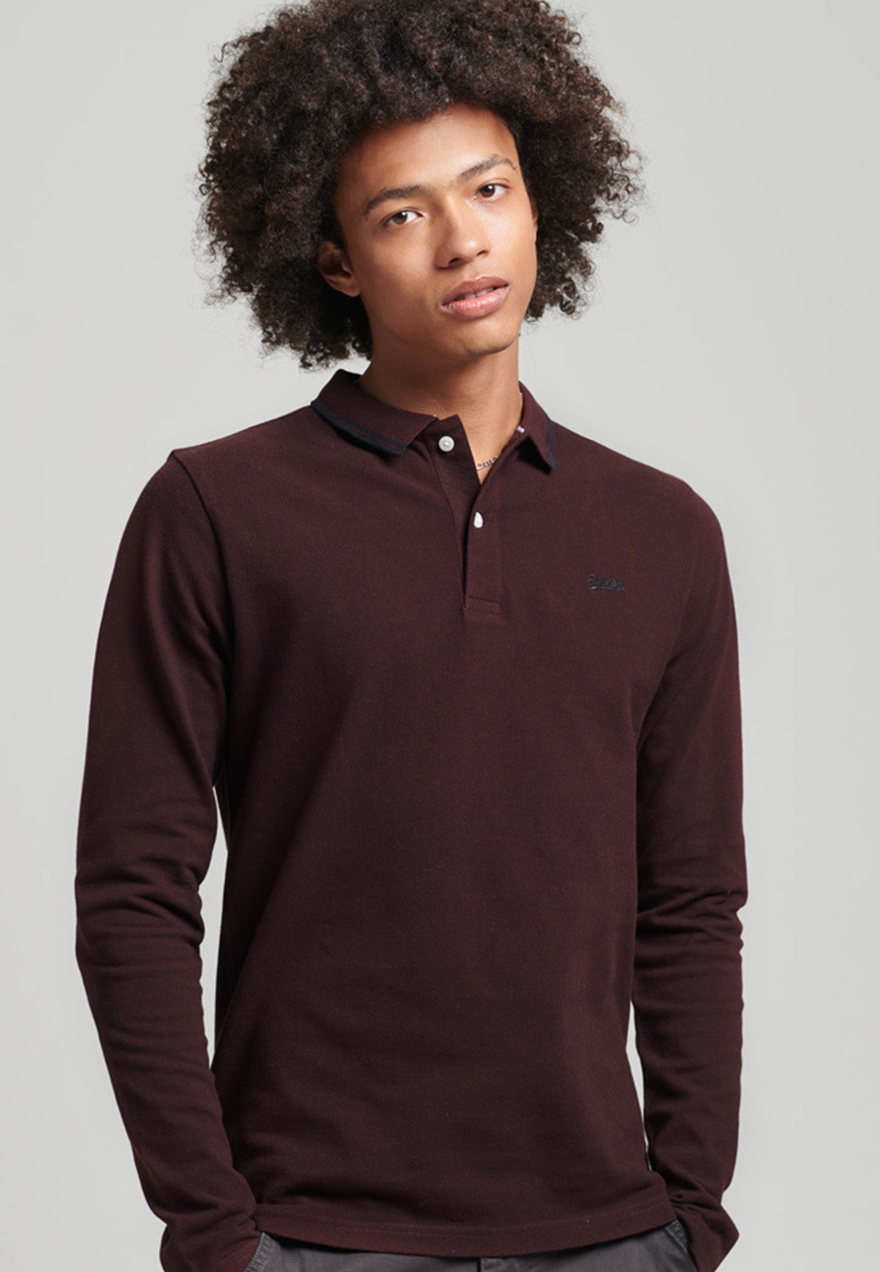 maroon and black polo shirt
