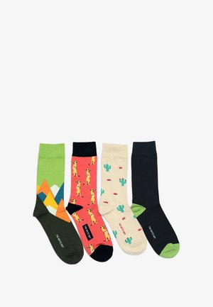 Four pairs of socks: green with mountain design, pink with meerkat print, beige with cactus pattern, and solid dark colors with contrasting toes.