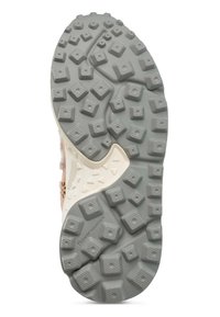 Shoe sole with a textured gray rubber surface featuring square and triangle patterns, enhancing grip for outdoor use.