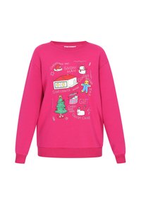 Rózsaszín pulóver ünnepi mintával, amely fát, hóembert, mézeskalács figurát és ünnepi feliratokat ábrázol. Puha anyagból készült, hosszú ujjakkal.