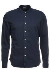 Marineblaues Langarmhemd für Herren mit Stehkragen und weißen Knöpfen auf der Vorderseite.