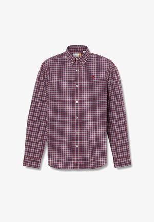 Camisa de manga larga a cuadros rojos y azules con cuello abotonado, botones blancos y un logo bordado en el pecho. Tejido de algodón.