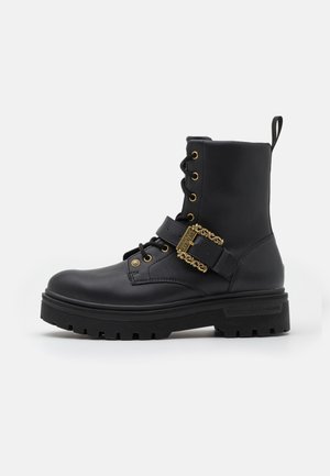SYRIUS - Lace-up ankle boots - nero/oro
