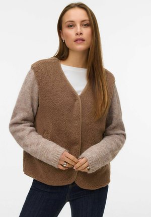 Brown fleece vest with a textured body and light gray knit sleeves. Features a rounded neckline and simple button closure.