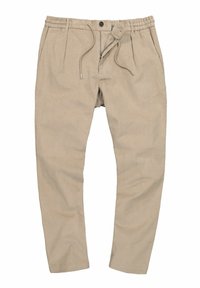 Pantaloni in corda beige con vita elastica, coulisse regolabile e pieghe frontali. Presentano una chiusura con zip e bottone.