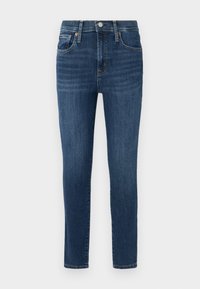 Dark blue denim jeans with a slim fit, five-pocket design, copper button accents, and slight fading on front. Clean hem and standard waistband.