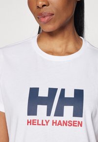 Helly Hansen HH LOGO
 - Triko s potiskem - white