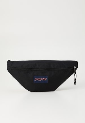 Schwarze Bauchtasche aus strapazierfähigem Stoff, ausgestattet mit einem Reißverschluss und einem auffälligen, navyblauen Jansport-Logopatch auf einer strukturierten Oberfläche.