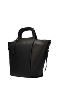 Black leather tote bag with textured finish, structured shape, two short handles, and a gold logo detail at the front for contrast.