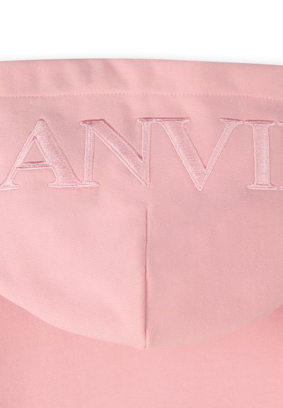 Felpa rosa con ricamo "ANVI" sulla schiena. Tessuto morbido, vestibilità comoda e un grande cappuccio. Design semplice senza ulteriori motivi.